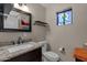 Bathroom with granite vanity and a stained-glass window at 15019 N Mayflower Dr, Fountain Hills, AZ 85268