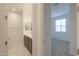 Bathroom with double vanity and view of bedroom at 1619 E Joelle Dr, Casa Grande, AZ 85122