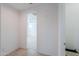 Hallway with door to bedroom and closet at 1619 E Joelle Dr, Casa Grande, AZ 85122