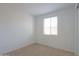 Simple bedroom with window and neutral carpeting at 1619 E Joelle Dr, Casa Grande, AZ 85122