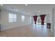 Bright living room with sliding glass doors and neutral color palette at 1619 E Joelle Dr, Casa Grande, AZ 85122