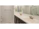 Double sink bathroom with dark brown vanity at 1619 E Joelle Dr, Casa Grande, AZ 85122