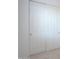 White sliding door closet with neutral carpeting at 1619 E Joelle Dr, Casa Grande, AZ 85122