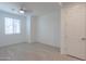 Bright bedroom with tile flooring and ceiling fan at 1619 E Joelle Dr, Casa Grande, AZ 85122