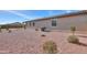 Desert landscaping with gravel and some small plants at 1619 E Joelle Dr, Casa Grande, AZ 85122
