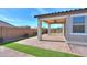 Covered patio with brick flooring and ceiling fan at 1619 E Joelle Dr, Casa Grande, AZ 85122