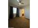 Spacious bedroom with ensuite bathroom and ceiling fan at 2311 E Coconino Dr, Chandler, AZ 85249