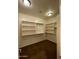 Large walk-in closet with ample shelving and hanging space at 2311 E Coconino Dr, Chandler, AZ 85249