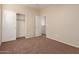 Bright bedroom with mirrored closet and access to loft at 38318 N La Grange Ln, San Tan Valley, AZ 85140