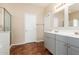 Bathroom with double vanity, tile floor, and shower at 38318 N La Grange Ln, San Tan Valley, AZ 85140
