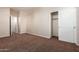 Bright bedroom featuring a large closet and neutral decor at 38318 N La Grange Ln, San Tan Valley, AZ 85140