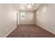 Spacious bedroom with plush carpeting and ceiling fan at 38318 N La Grange Ln, San Tan Valley, AZ 85140