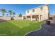 Large backyard with grassy area and gravel landscaping at 38318 N La Grange Ln, San Tan Valley, AZ 85140