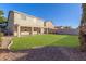Large backyard featuring a grassy area and gravel landscaping at 38318 N La Grange Ln, San Tan Valley, AZ 85140