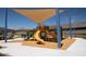 Modern playground with a slide and shade structure at 16203 W Mariposa Grande --, Surprise, AZ 85387