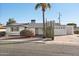 Ranch style home with carport and mature landscaping at 10623 W El Rancho Dr, Sun City, AZ 85351