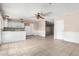 Bright kitchen features white cabinets, tile floors, and an island at 1621 W Stottler Dr, Chandler, AZ 85224