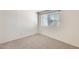 Bright bedroom with carpet flooring and a window at 222 W Brown Rd # 117, Mesa, AZ 85201