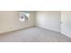 Spacious bedroom with carpet and large window at 222 W Brown Rd # 117, Mesa, AZ 85201