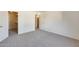 Bright bedroom with carpet and large closet at 222 W Brown Rd # 117, Mesa, AZ 85201