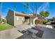 Community building with benches and landscaping at 222 W Brown Rd # 117, Mesa, AZ 85201