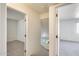 Upstairs hallway with carpet and access to bedrooms at 222 W Brown Rd # 117, Mesa, AZ 85201