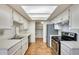 Bright kitchen features stainless steel appliances and ample counter space at 222 W Brown Rd # 117, Mesa, AZ 85201