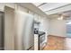 Stainless steel appliances and white cabinetry in this kitchen at 222 W Brown Rd # 117, Mesa, AZ 85201