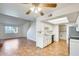 Open floor plan with kitchen, living room, and tile flooring at 222 W Brown Rd # 117, Mesa, AZ 85201