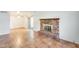 Living room with a brick fireplace and tile flooring at 222 W Brown Rd # 117, Mesa, AZ 85201