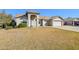 House exterior showcasing a two-car garage and neat landscaping at 4175 S Marisol Ln, Gilbert, AZ 85297