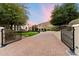 Gated driveway leading to a luxurious home at 6105 E Sage Dr, Paradise Valley, AZ 85253