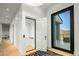 Elegant entryway with elevator and view from glass door at 4880 E Lone Mountain N Rd, Cave Creek, AZ 85331