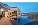 Luxury infinity pool and patio with mountain views at 4880 E Lone Mountain N Rd, Cave Creek, AZ 85331