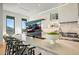 Island kitchen features a hidden TV and mountain views at 4880 E Lone Mountain N Rd, Cave Creek, AZ 85331
