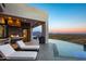Luxury pool and outdoor kitchen with mountain views at 4880 E Lone Mountain N Rd, Cave Creek, AZ 85331