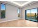 Bright bedroom with wood floors and mountain views at 4880 E Lone Mountain N Rd, Cave Creek, AZ 85331
