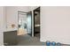 Hallway with access to a bedroom and a small bathroom; gym equipment is also visible at 4880 E Lone Mountain N Rd, Cave Creek, AZ 85331