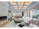 Bright living room with a cozy sectional sofa and modern decor at 4880 E Lone Mountain N Rd, Cave Creek, AZ 85331