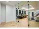 Glass-walled game room with wet bar and seating area at 4880 E Lone Mountain N Rd, Cave Creek, AZ 85331