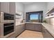 Outdoor kitchen with modern appliances and mountain views at 4880 E Lone Mountain N Rd, Cave Creek, AZ 85331