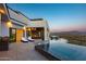 Infinity pool with mountain views at sunset at 4880 E Lone Mountain N Rd, Cave Creek, AZ 85331