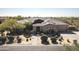 Single-story home with a large backyard, driveway, and landscaping at 7377 E Alta Sierra Dr, Scottsdale, AZ 85266