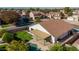 An aerial view showcasing a home's backyard with a pool and covered patio at 10363 W Willow Ln, Avondale, AZ 85392