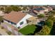 Aerial view of a home's backyard oasis, featuring a pool and covered patio at 10363 W Willow Ln, Avondale, AZ 85392