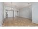 Bright dining room with tile floors and a chandelier at 10363 W Willow Ln, Avondale, AZ 85392