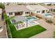 An aerial view of the house and backyard with pool and pergola at 10553 E Relativity Ave, Mesa, AZ 85212