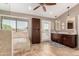 Spa-like bathroom with soaking tub and walk-in shower at 1201 E Le Marche Ave, Phoenix, AZ 85022