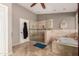 Modern bathroom with a large walk-in shower and soaking tub at 1201 E Le Marche Ave, Phoenix, AZ 85022