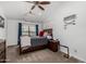 Bright bedroom with double bed and ceiling fan at 1201 E Le Marche Ave, Phoenix, AZ 85022